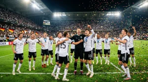 Deutsche Fußballmannschaft feiert Sieg im Stadion mit Konfetti
